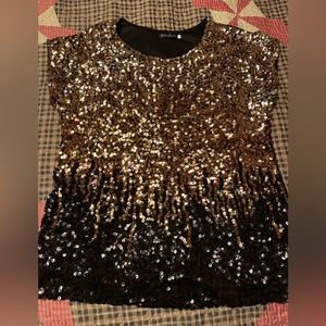 Beautiful gold and black dress shirt, soft material , size L, Worn once.